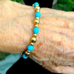 Gold filled and faceted turquoise bead bracelet.